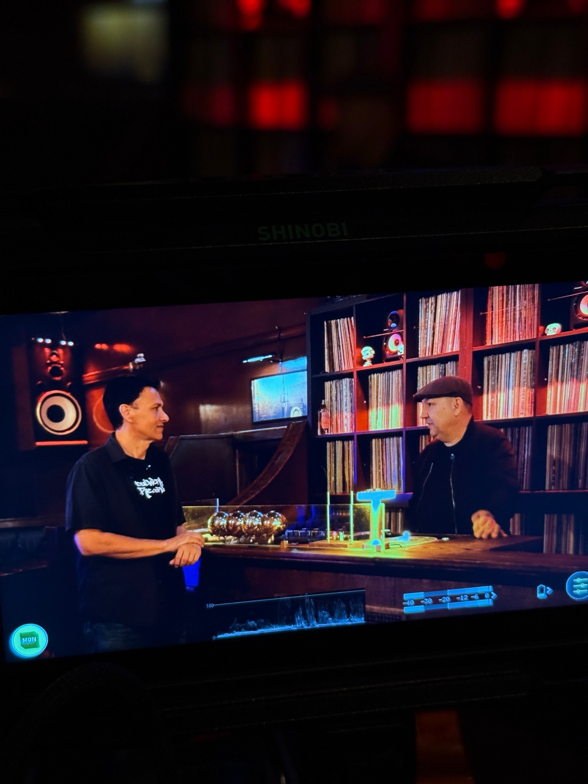 Behind the scenes: an interview framed on a production monitor.